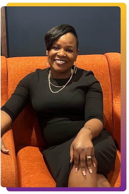 faith-nyandoro-sitting-on-couch