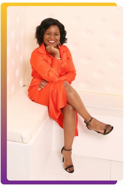 faith-nyandoro-sitting-on-high-back-couch